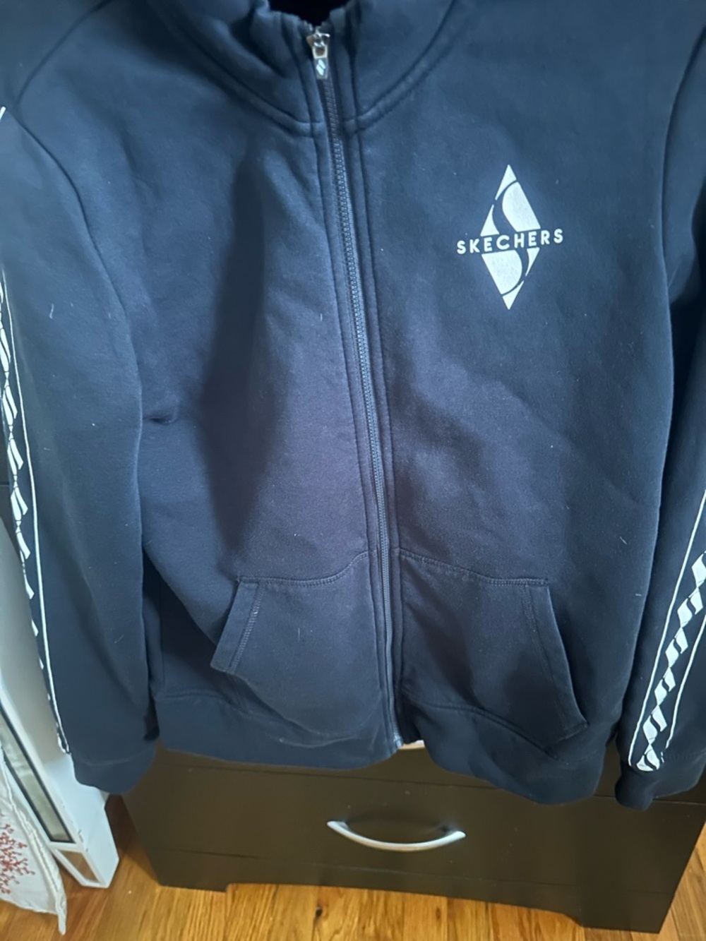 Skechers women ‘s black Full-Zip Hoodie jacket with White Logo Accents